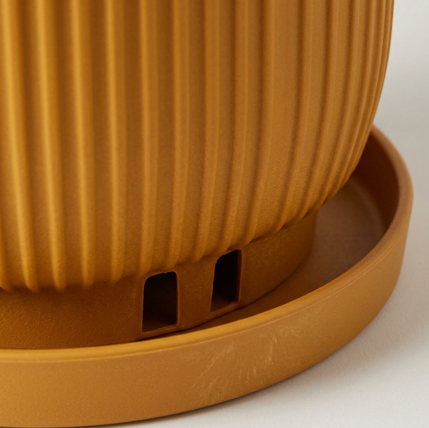 Fndzk Archrib Plastic Planter 9 in Ochre with Saucer - Detail view